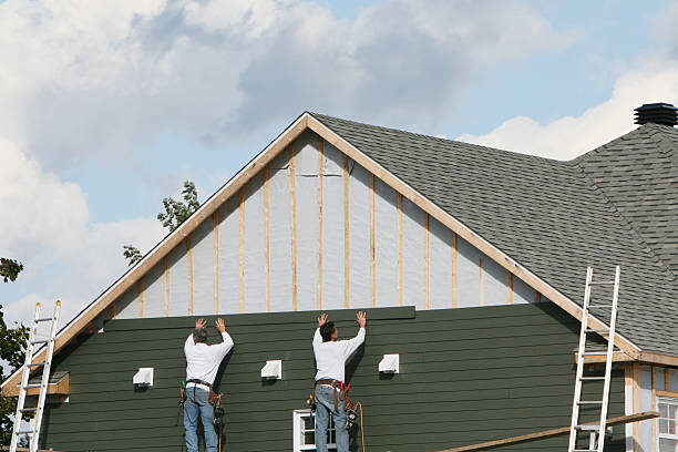 Professional Emergency Siding Repair technician working in Kent, OH